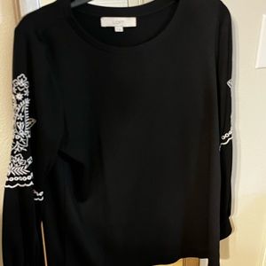 Black with white stitching detail